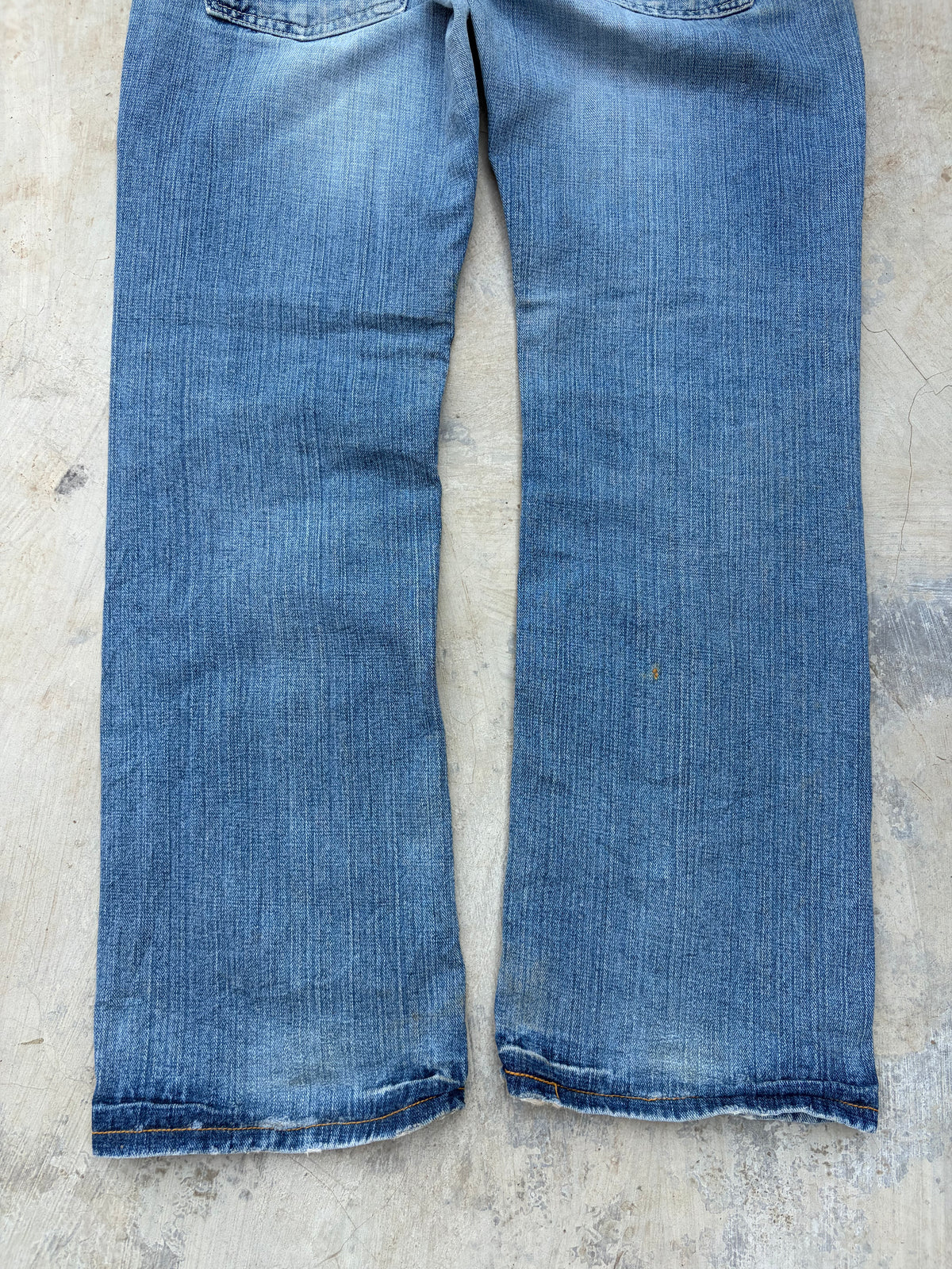 Vintage Levi’s 513 Low-Rise Buckle Back Jeans 32