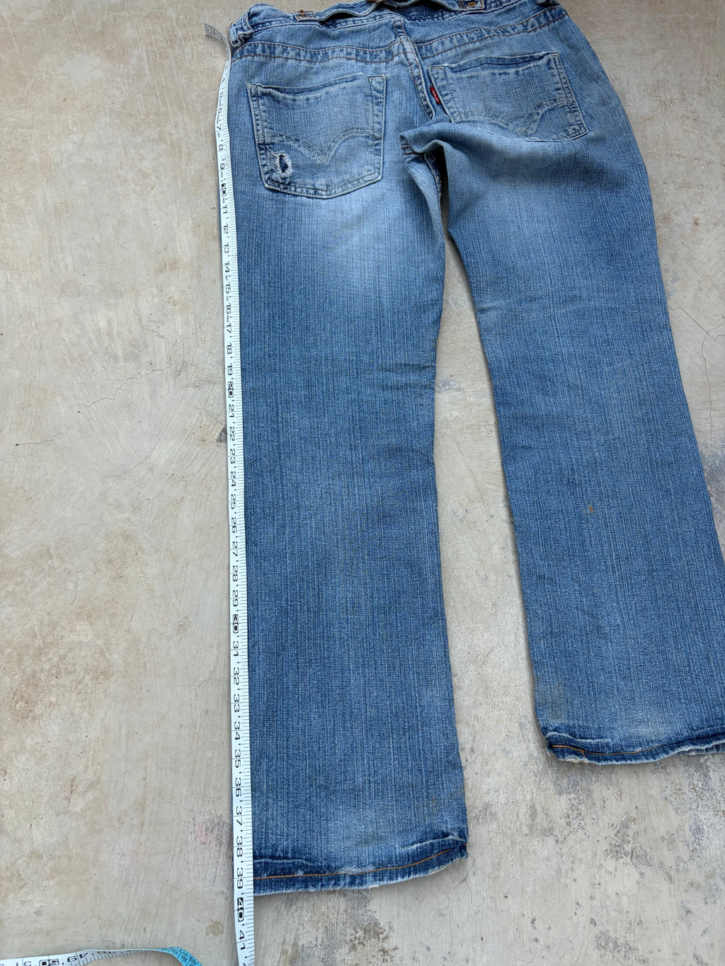 Vintage Levi’s 513 Low-Rise Buckle Back Jeans 32