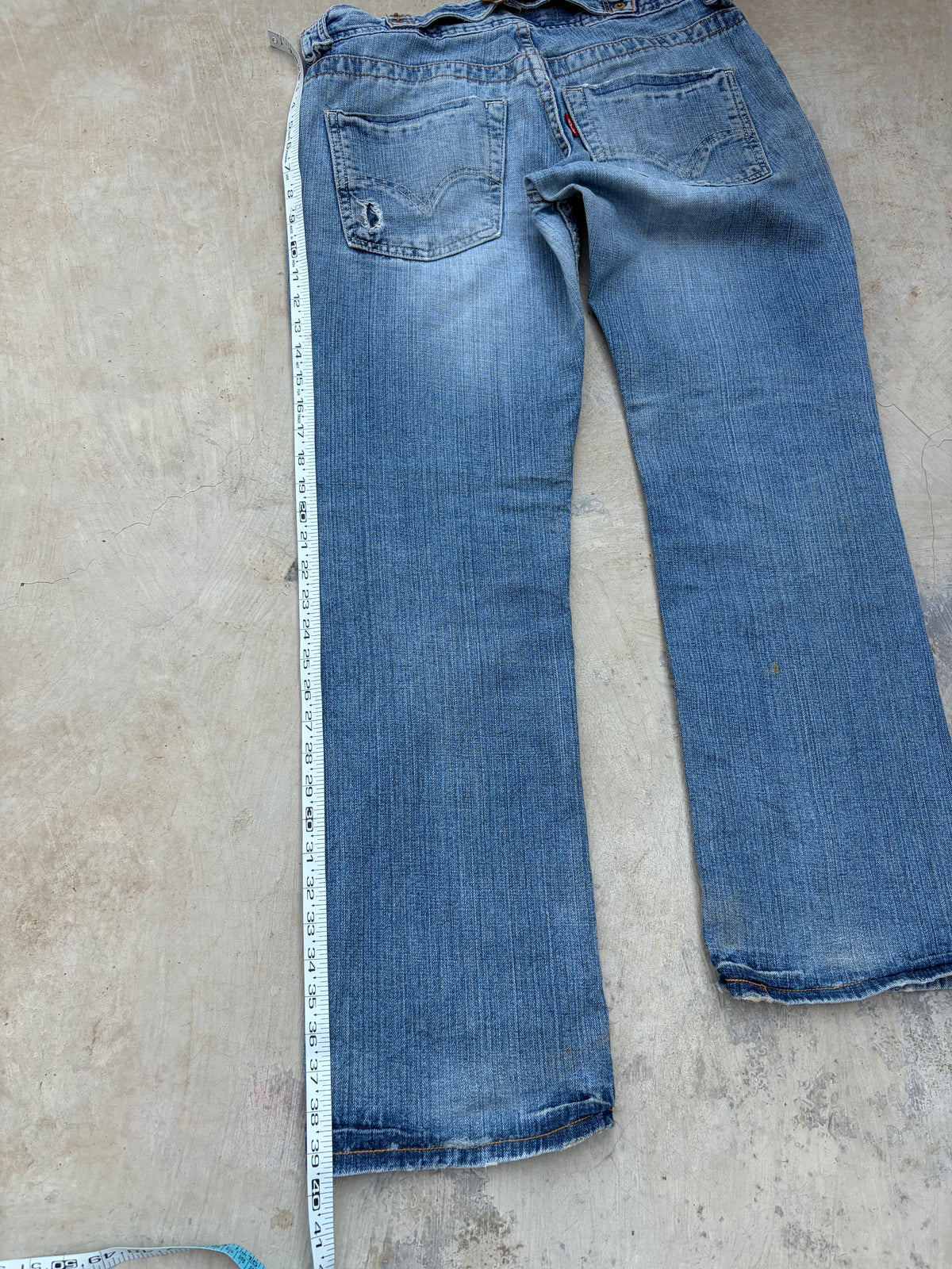 Vintage Levi’s 513 Low-Rise Buckle Back Jeans 32