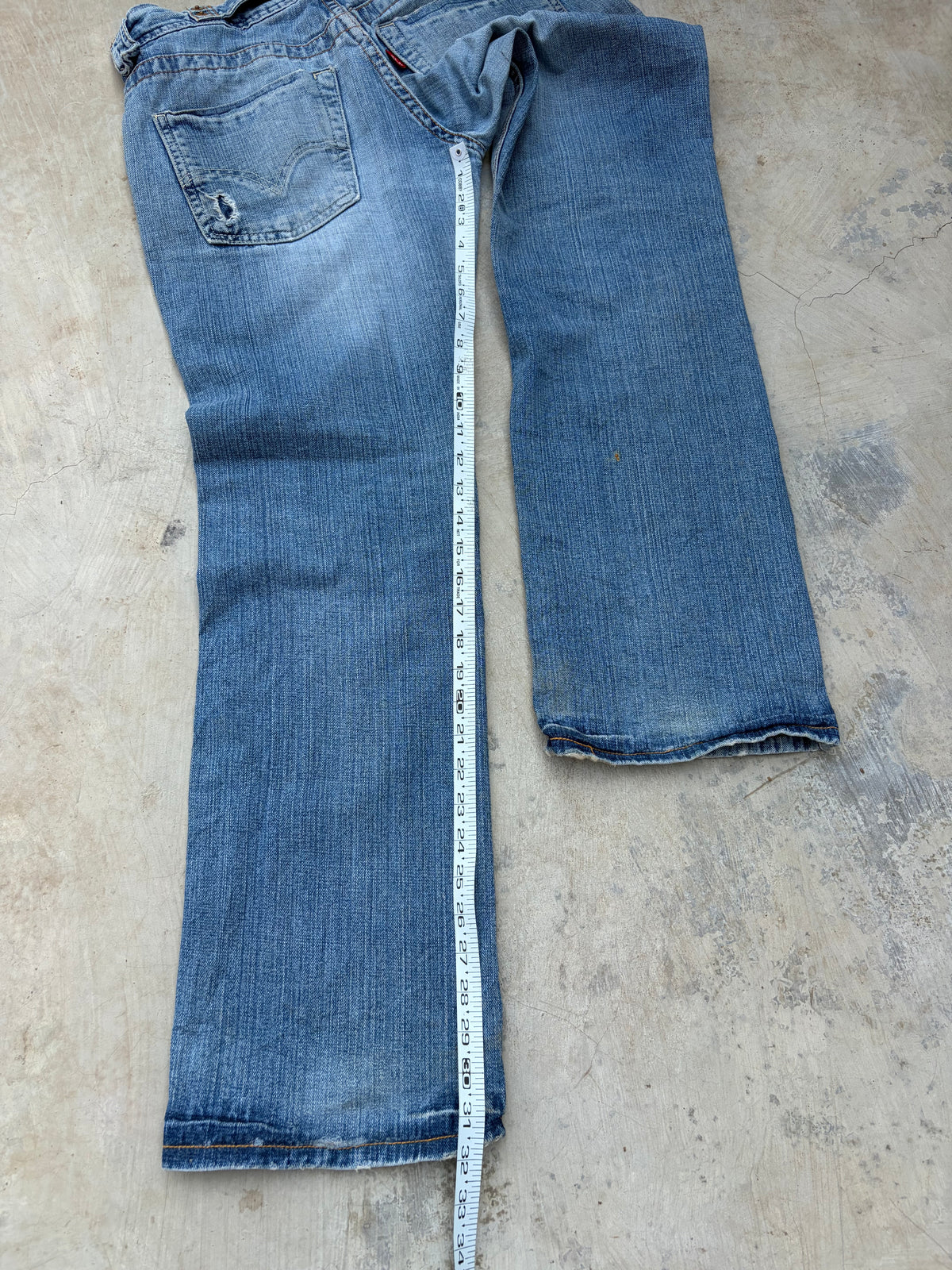 Vintage Levi’s 513 Low-Rise Buckle Back Jeans 32