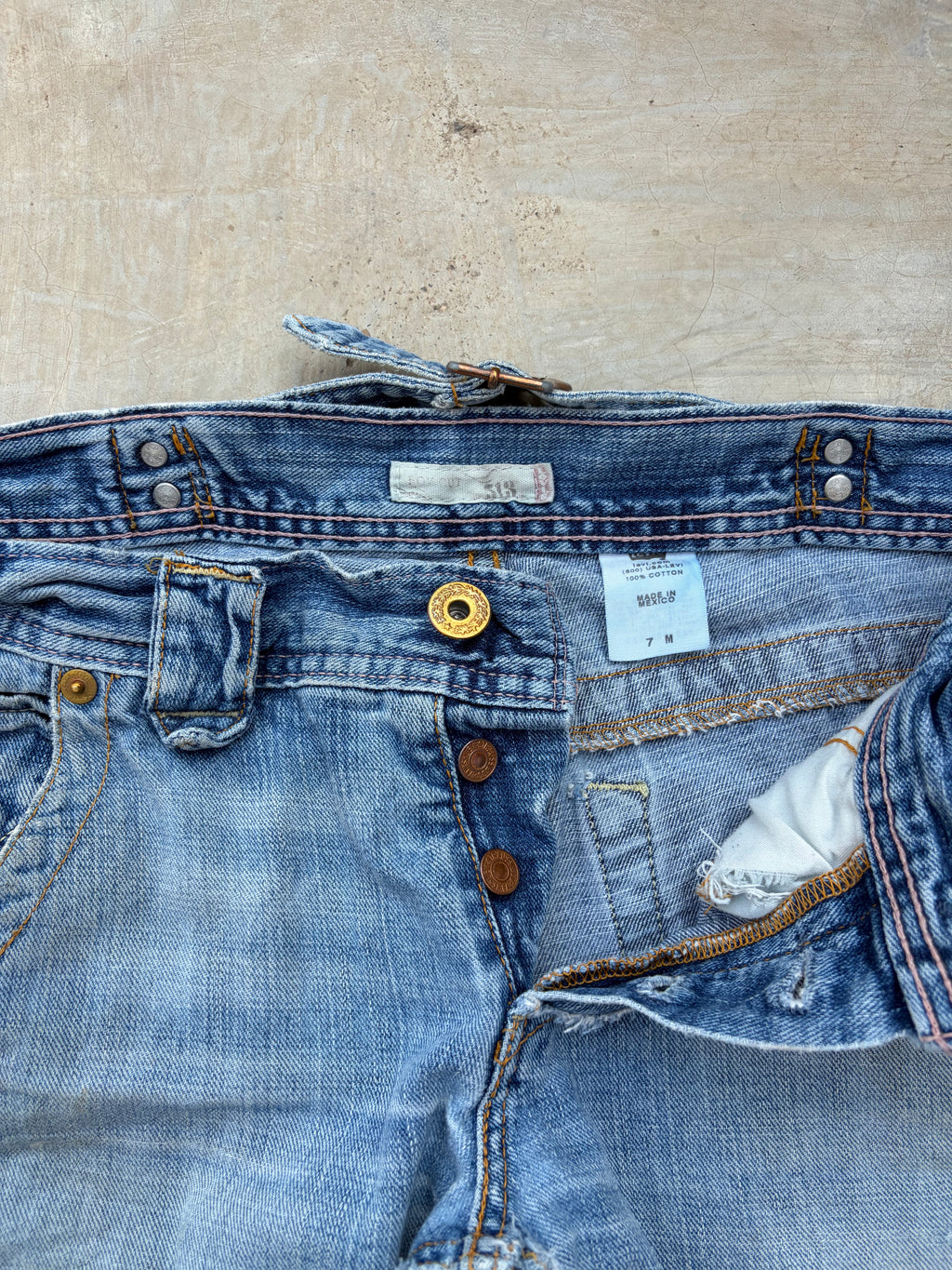 Vintage Levi’s 513 Low-Rise Buckle Back Jeans 32