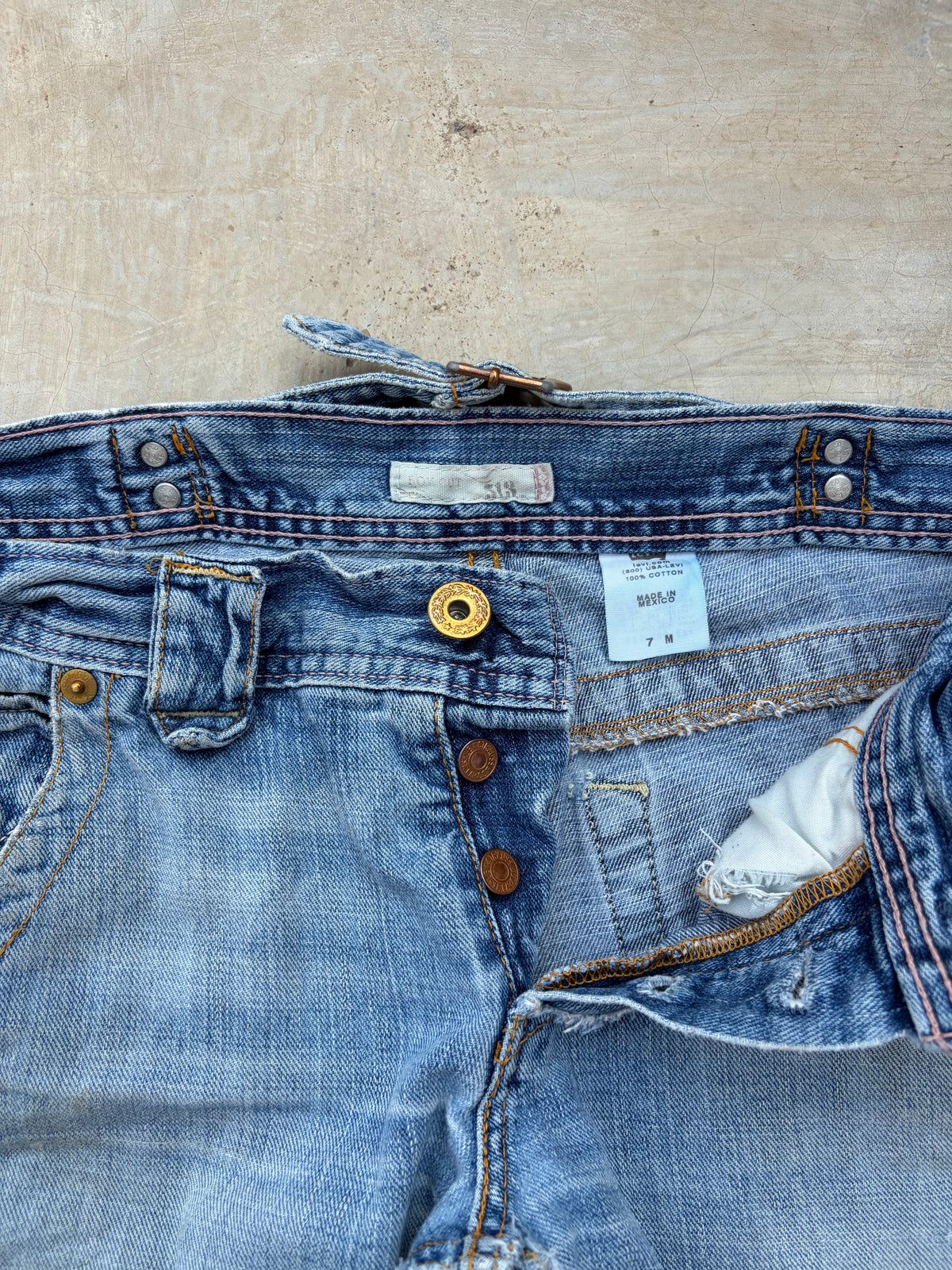 Vintage Levi’s 513 Low-Rise Buckle Back Jeans 32